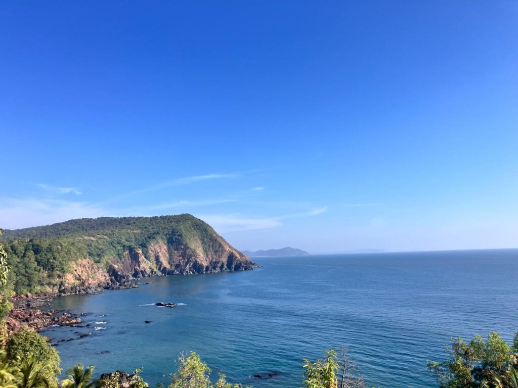 Panoramic view of the turquoise beaches and mountains of Goa
